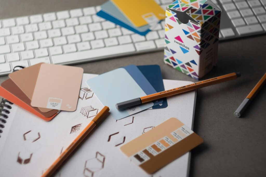 Color swatch cards on a designer's desk