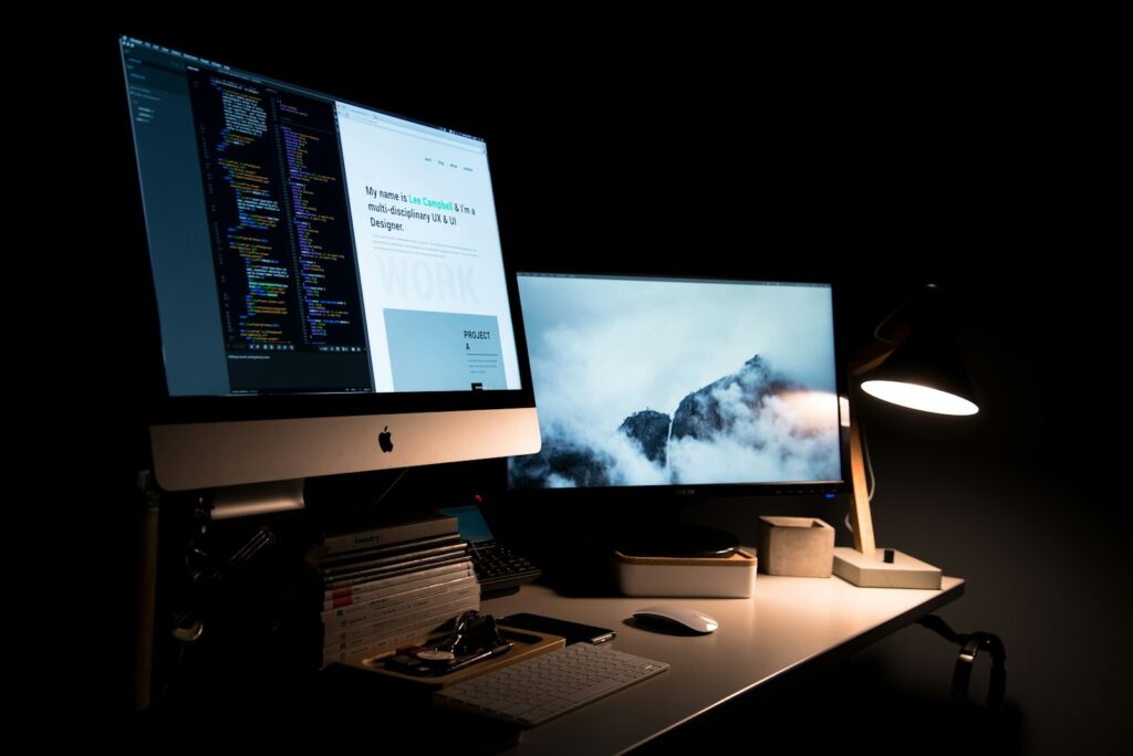 Web design workspace with two screens