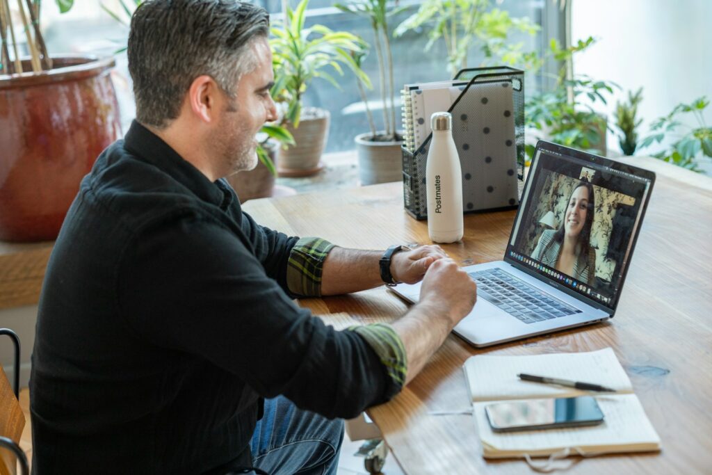 Professional on a video call at a desk